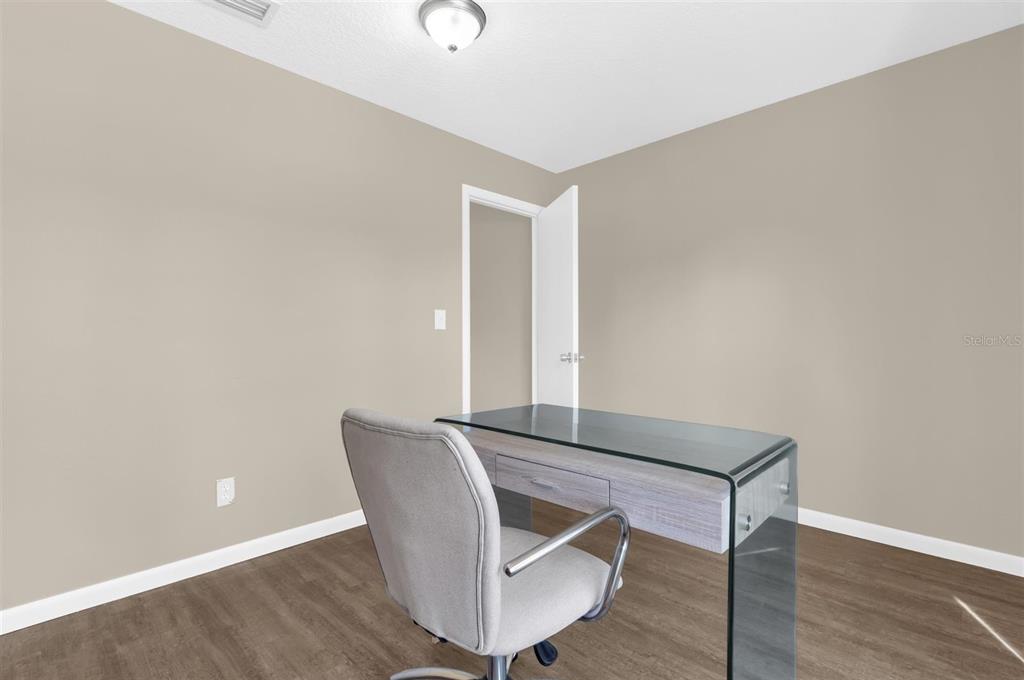 106 Oak Street Altamonte Springs, FL 32714 - Photo 18 of 30 a view of a workspace with wooden floor