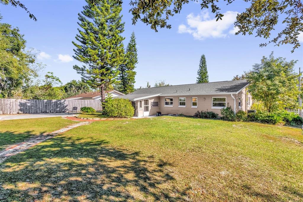 106 Oak Street Altamonte Springs, FL 32714 - Photo 23 of 30 a front view of house with yard and swimming pool
