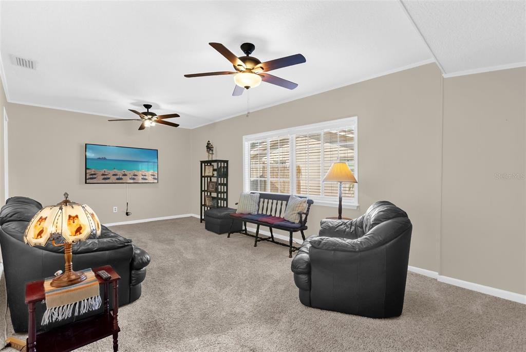 106 Oak Street Altamonte Springs, FL 32714 - Photo 5 of 30 a living room with furniture and a window