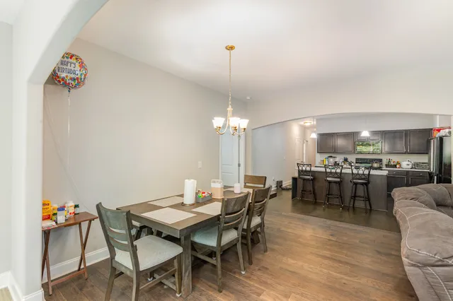 a view of a dining room with furniture