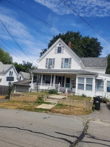 a front view of a house with swimming pool