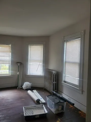 a room with furniture and window