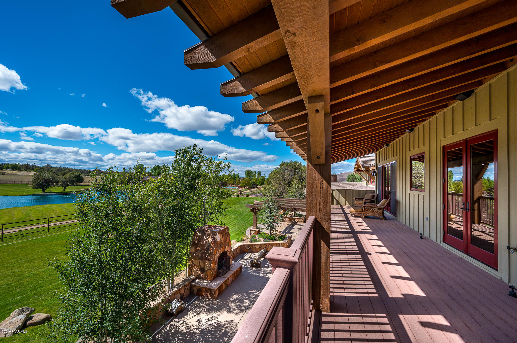 9120 North American Ranch Road Prescott, AZ 86305 - Photo 28 of 66 a view of a backyard with sitting area