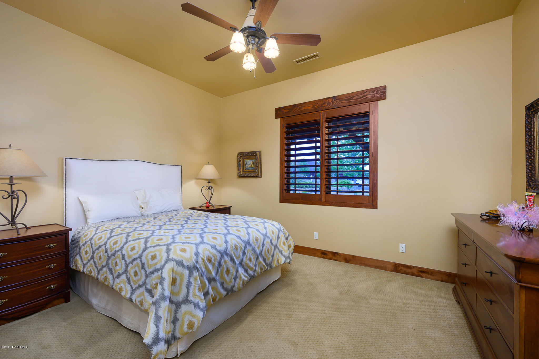 9120 North American Ranch Road Prescott, AZ 86305 - Photo 31 of 66 a bedroom with a bed and a window