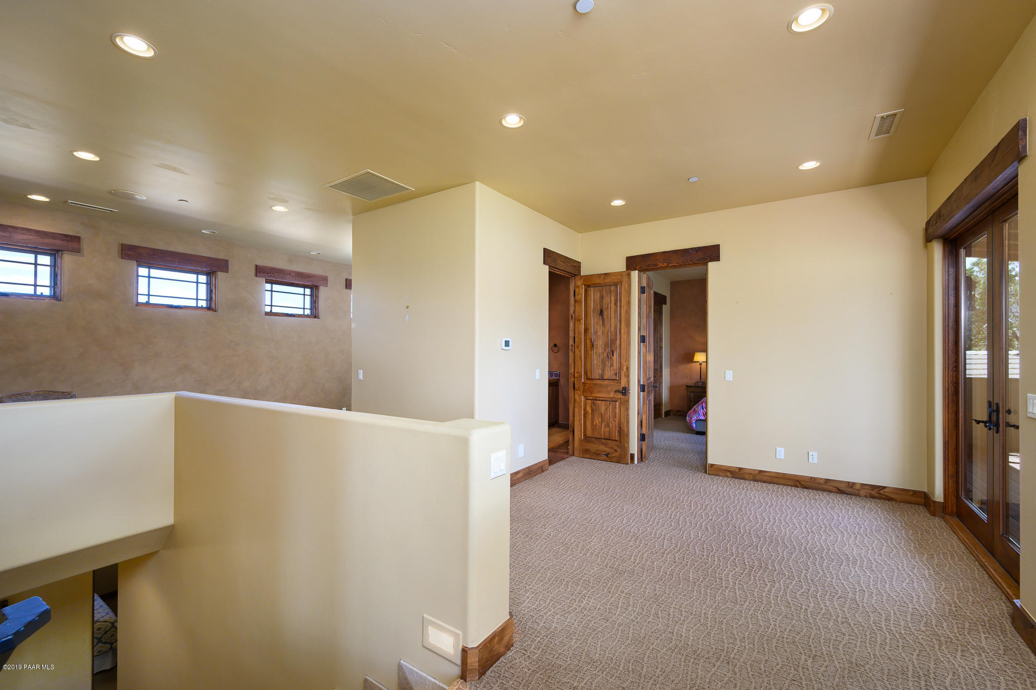 9120 North American Ranch Road Prescott, AZ 86305 - Photo 32 of 66 a view of an empty room with closet and a window