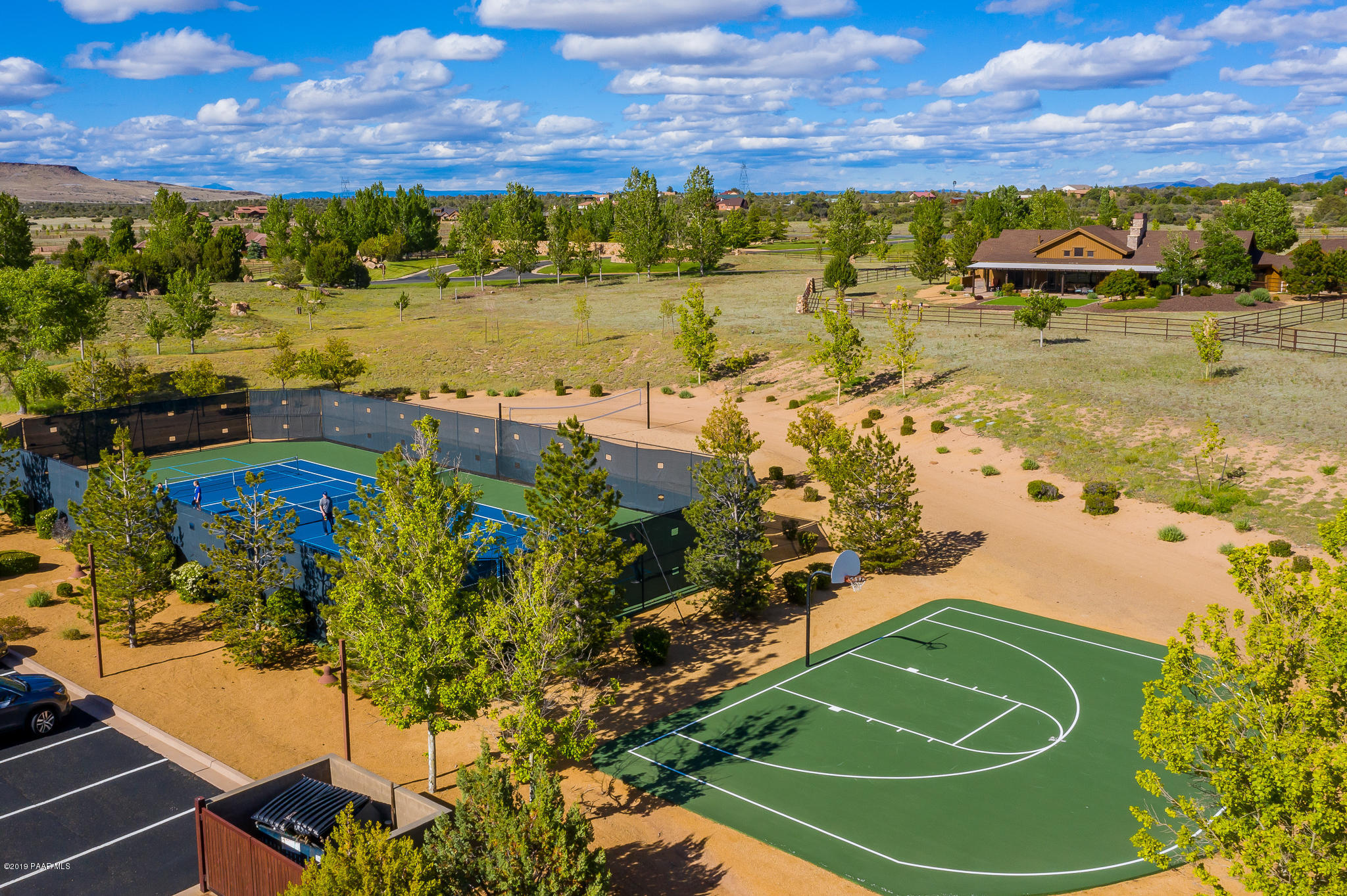 9120 North American Ranch Road Prescott, AZ 86305 - Photo 50 of 66 a view of a swimming pool with a lawn chairs