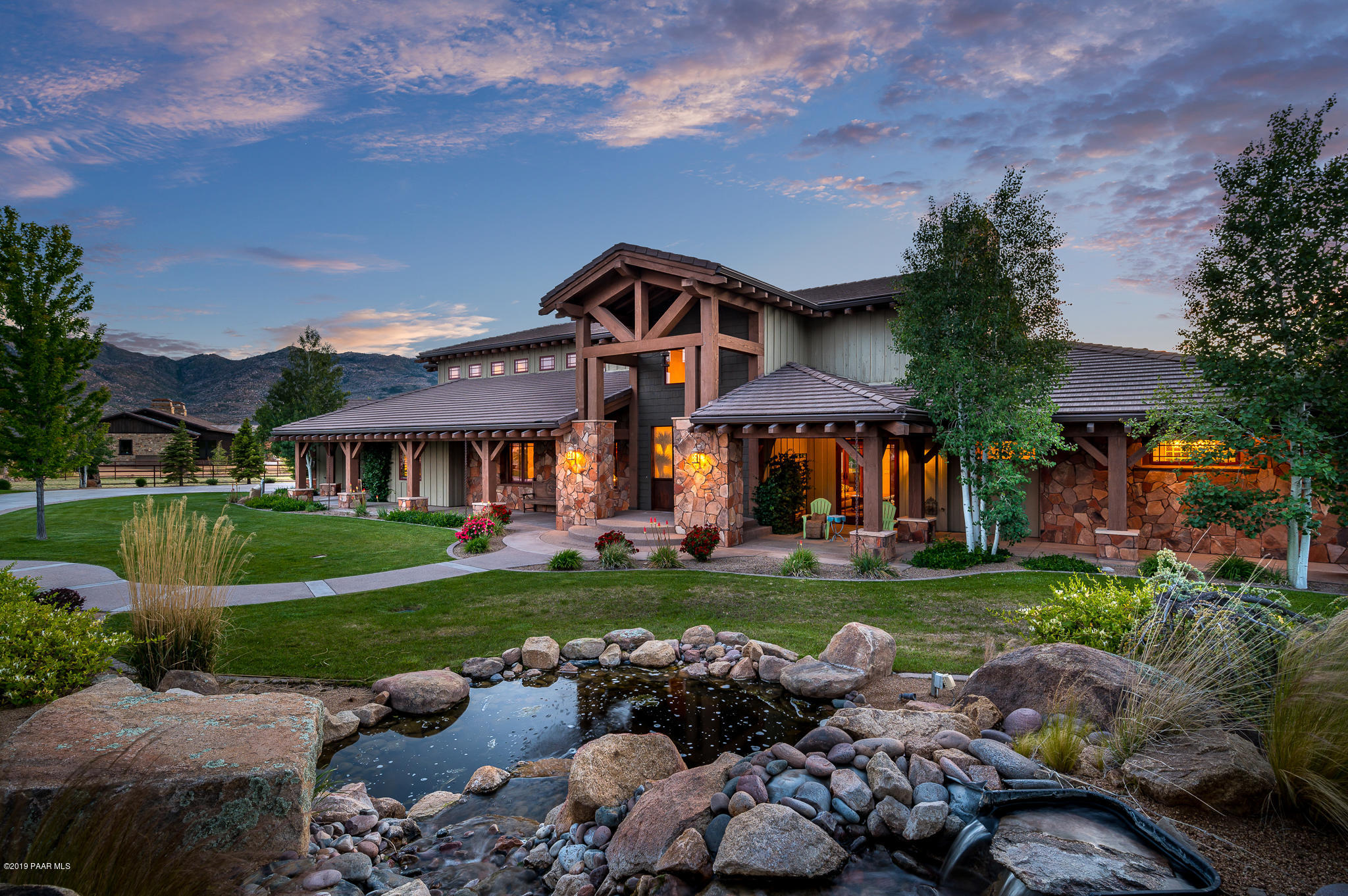 9120 North American Ranch Road Prescott, AZ 86305 - Photo 5 of 66 a front view of a house with garden