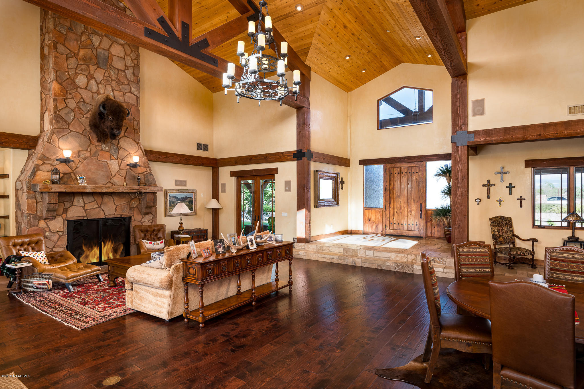 9120 North American Ranch Road Prescott, AZ 86305 - Photo 7 of 66 a living room with furniture and a fireplace