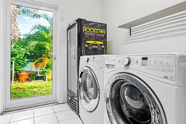 a utility room with dryer and washer