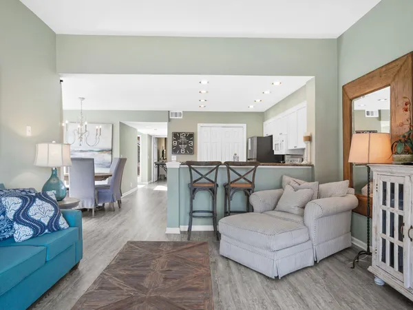 a living room with furniture and a table