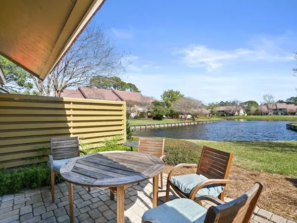 a view of a terrace with furniture and stove