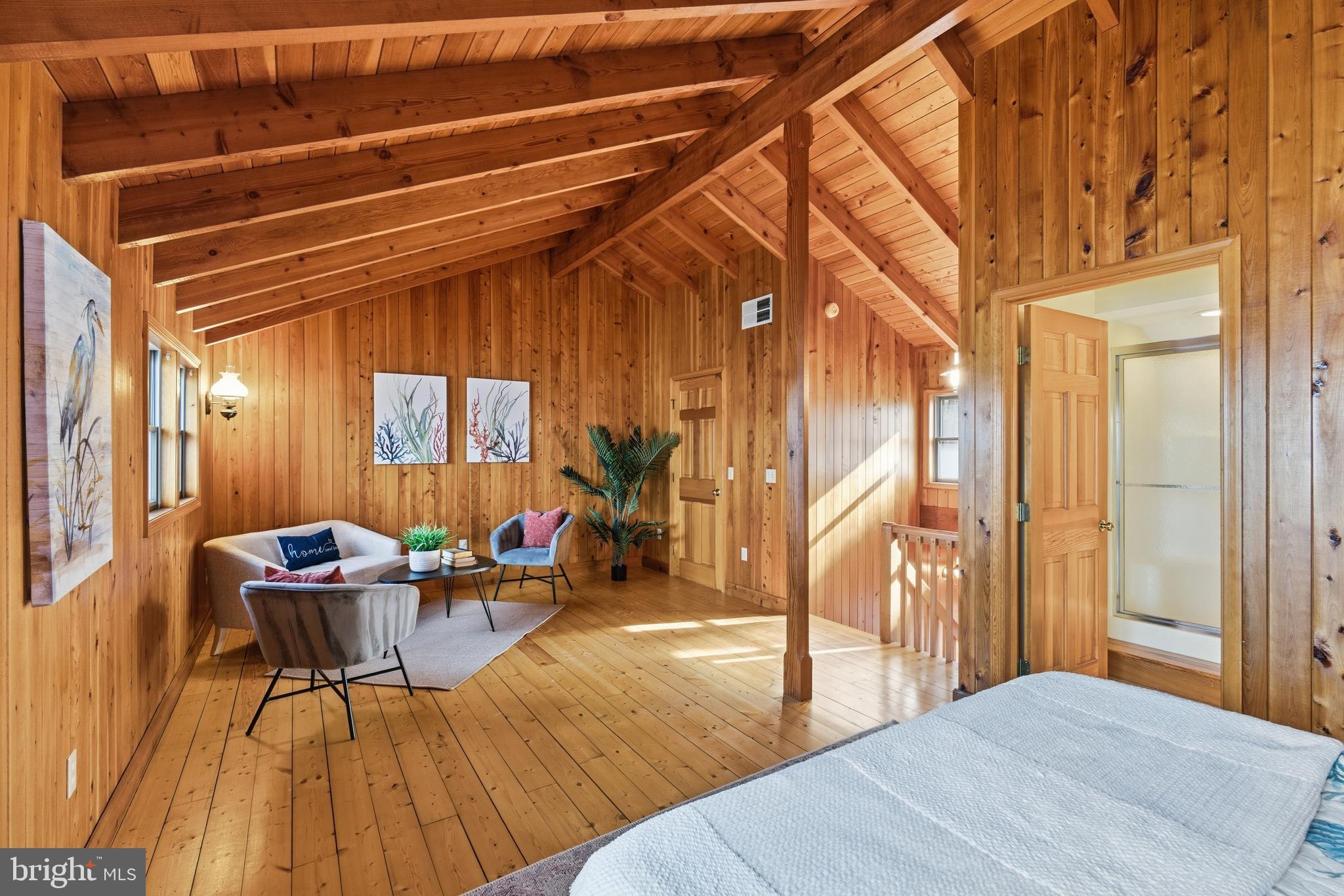 12400 Woods Road Worton, MD 21678 - Photo 21 of 29 a bedroom with a bed and wooden floor
