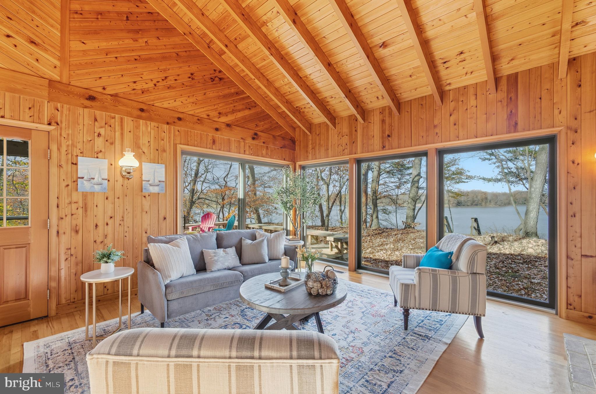 12400 Woods Road Worton, MD 21678 - Photo 6 of 29 a living room with furniture and a large window