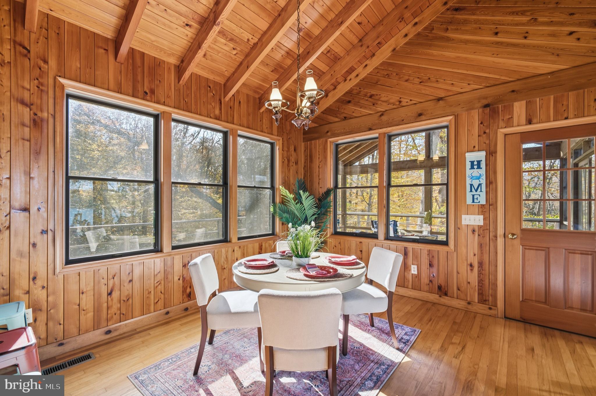12400 Woods Road Worton, MD 21678 - Photo 9 of 29 a view of a dining room with furniture window and wooden floor