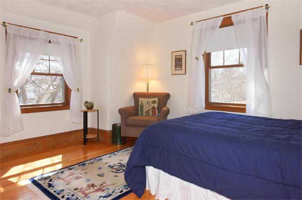 26 Jackson Road Medford, MA 02155 - Photo 13 of 25 a bedroom with a bed and a window