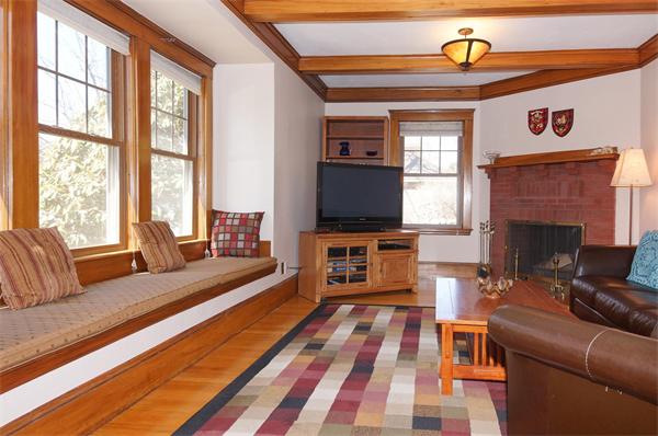 26 Jackson Road Medford, MA 02155 - Photo 2 of 25 a living room with furniture and a fireplace