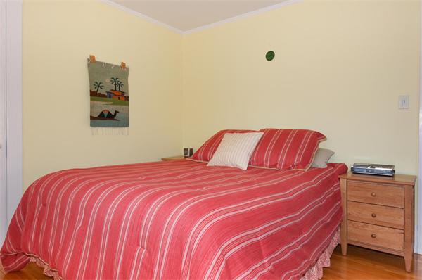 26 Jackson Road Medford, MA 02155 - Photo 10 of 25 a bedroom with a bed and cabinets