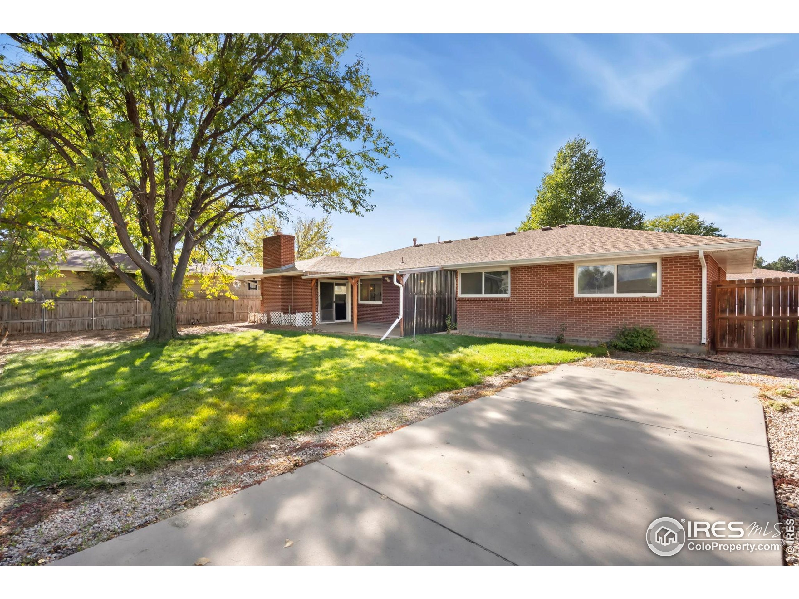 435 Birch Avenue Eaton, CO 80615 - Photo 32 of 32 a view of a yard in front of a house
