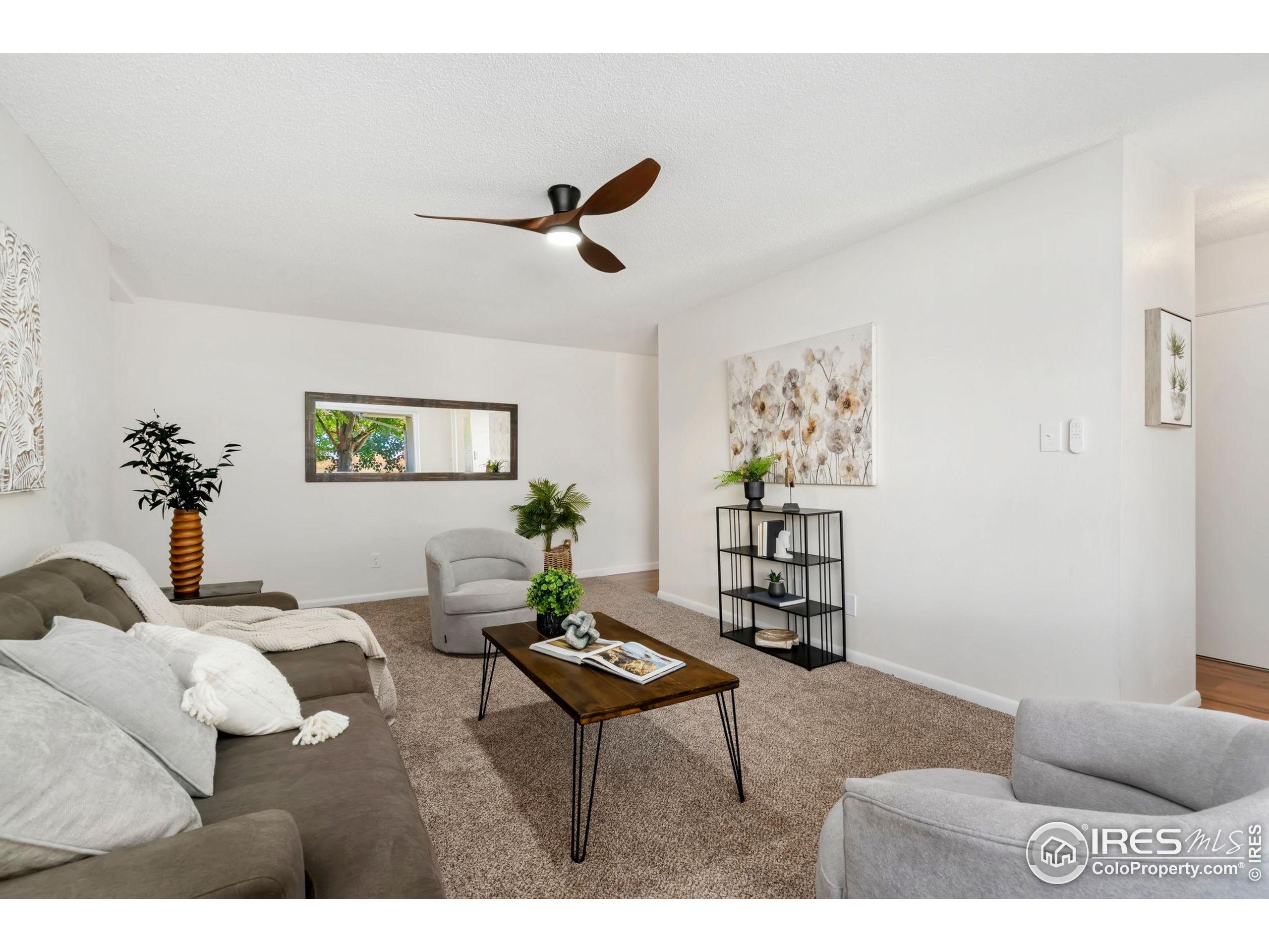 435 Birch Avenue Eaton, CO 80615 - Photo 4 of 32 a living room with furniture and wooden floor