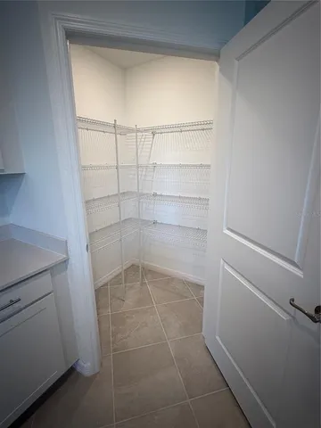 a empty closet with white paint