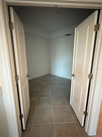 a view of an empty walk in closet