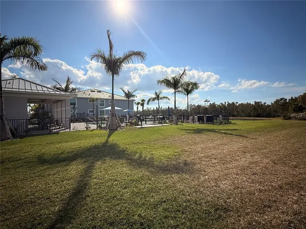 a view of a fountain in front of a house