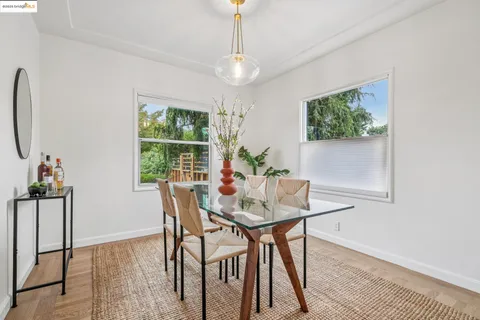 a kitchen with a sink cabinets and window