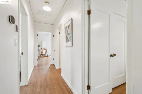a bathroom with a sink a mirror and a bathtub