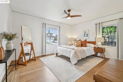 a balcony with trees in front of it