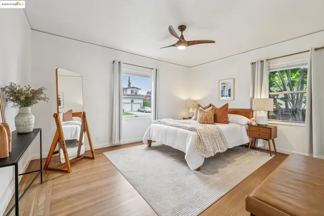 a balcony with trees in front of it