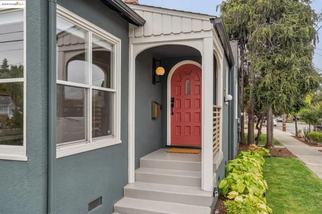 a front view of a house with a porch