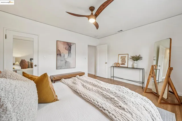 a terrace with outdoor seating and wooden floor