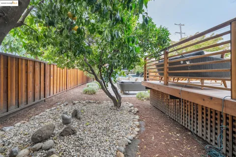 a view of a patio with a yard