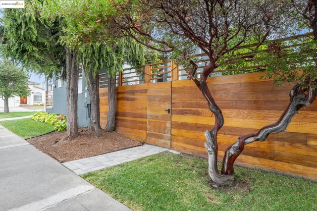 a front view of a house with large windows