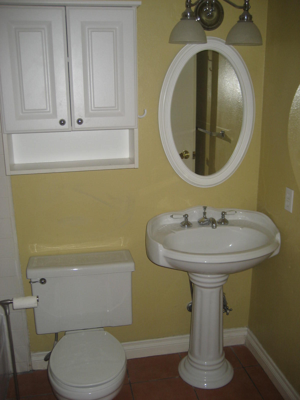 72724 Eagle Road, Unit 2 Palm Desert, CA 92260 - Photo 11 of 29 a bathroom with a sink and mirror
