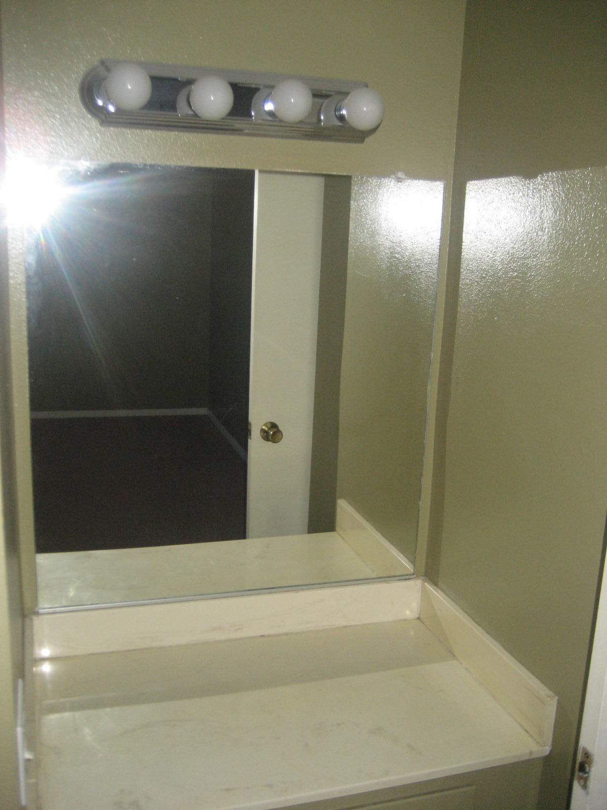 72724 Eagle Road, Unit 2 Palm Desert, CA 92260 - Photo 17 of 29 a bathroom with a shower and a mirror