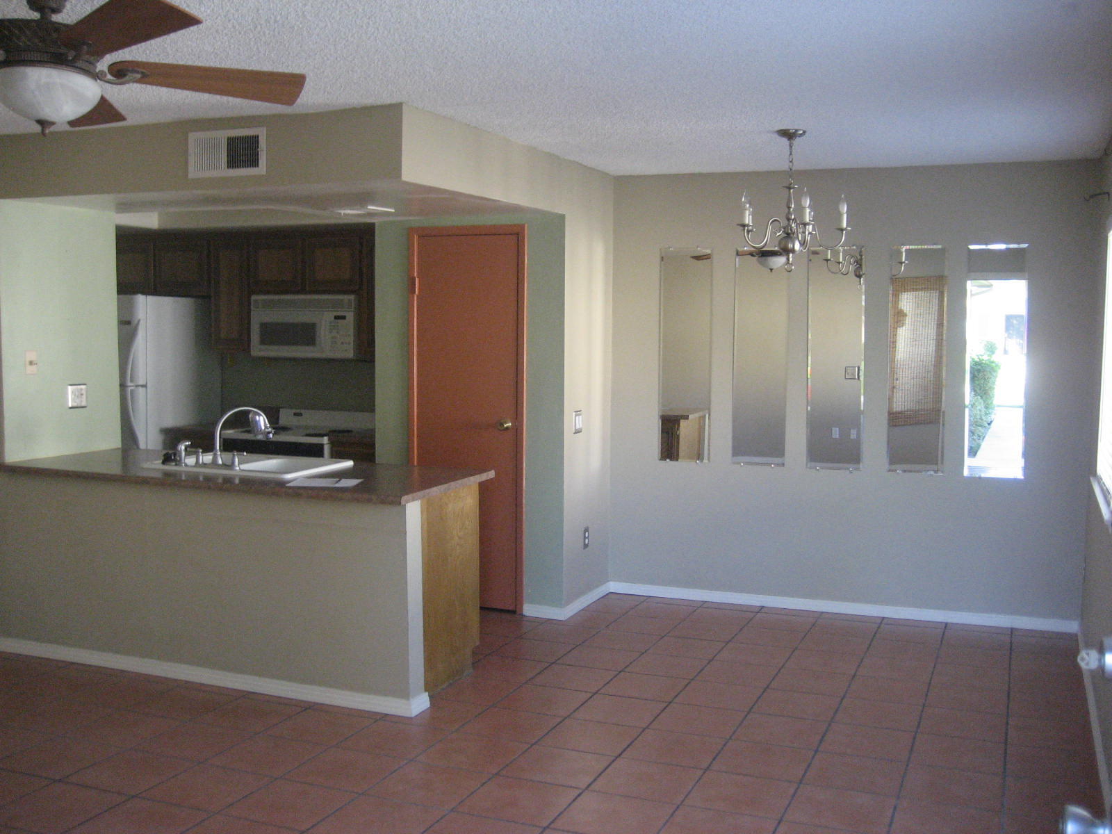 72724 Eagle Road, Unit 2 Palm Desert, CA 92260 - Photo 2 of 29 a view of a utility room with closet and a window