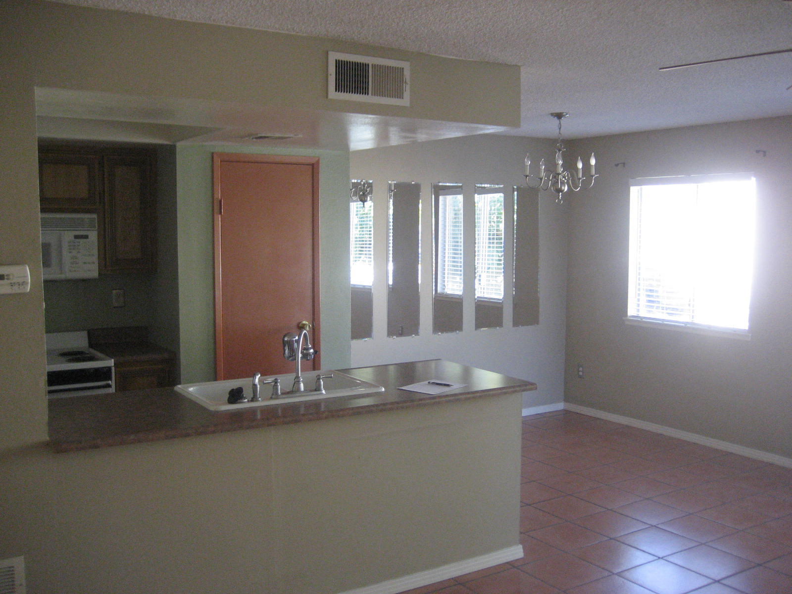 72724 Eagle Road, Unit 2 Palm Desert, CA 92260 - Photo 9 of 29 a view of kitchen with granite countertop cabinets and sink