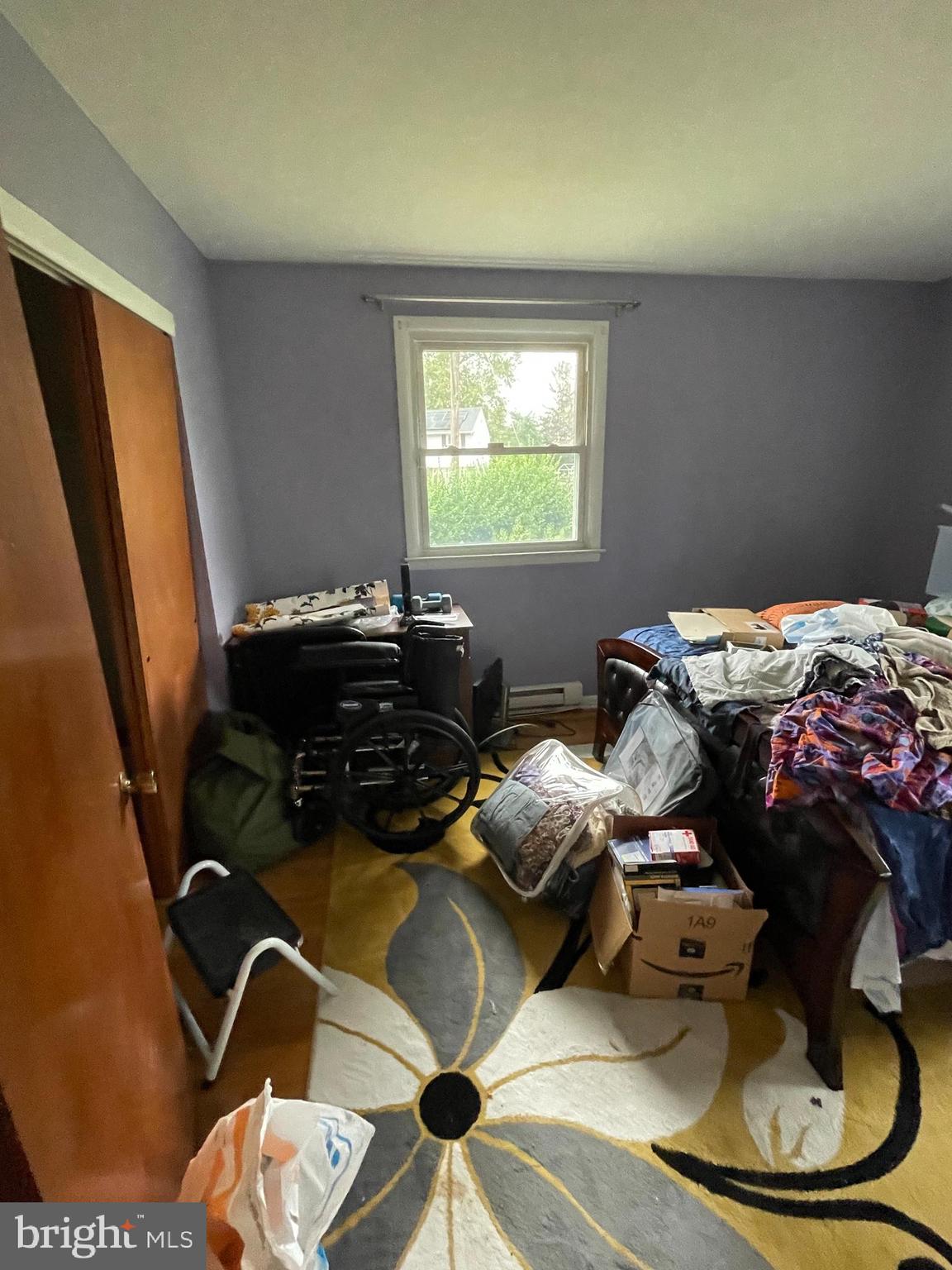 20 Castle Court Pemberton, NJ 08068 - Photo 14 of 18 a bed sitting in a bedroom next to a window