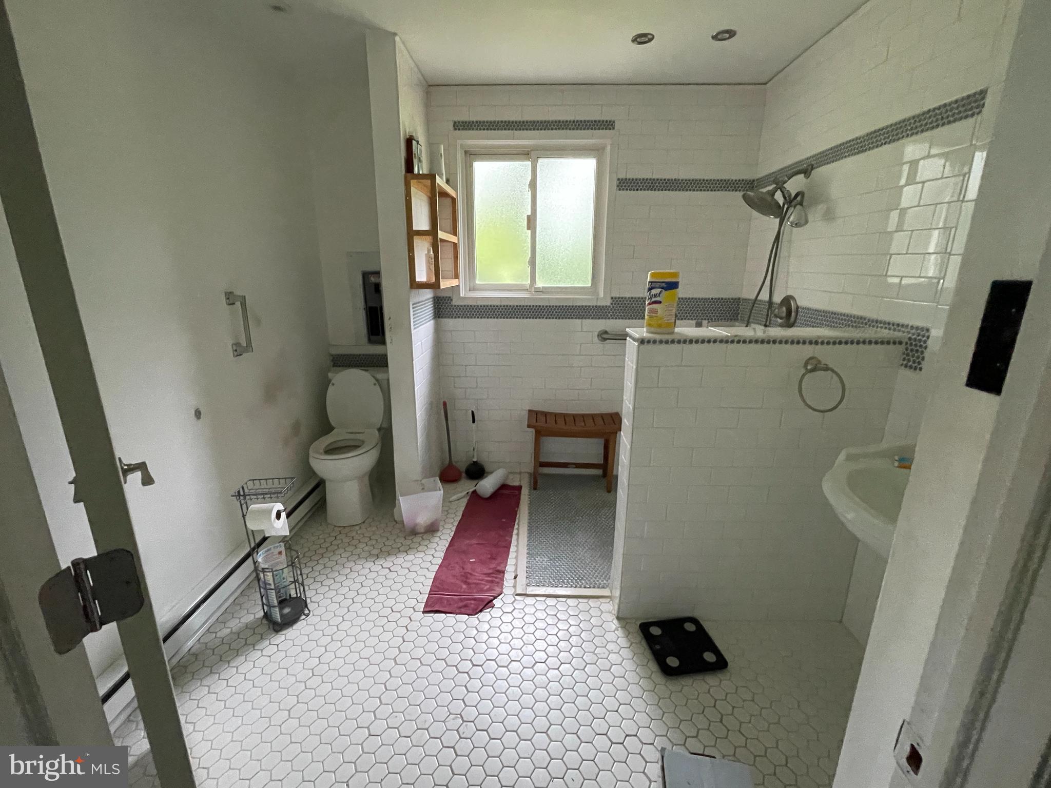 20 Castle Court Pemberton, NJ 08068 - Photo 10 of 18 a bathroom with a sink a toilet and a shower