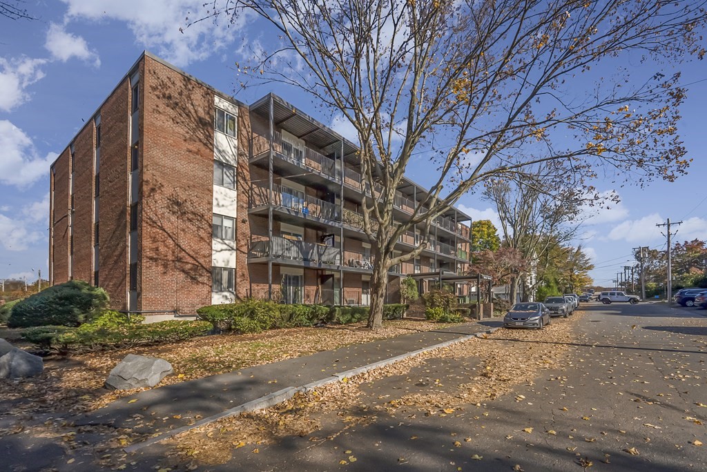 45 Oval Road, Unit 12 Quincy, MA 02170 - Photo 12 of 12 a view of road with large building