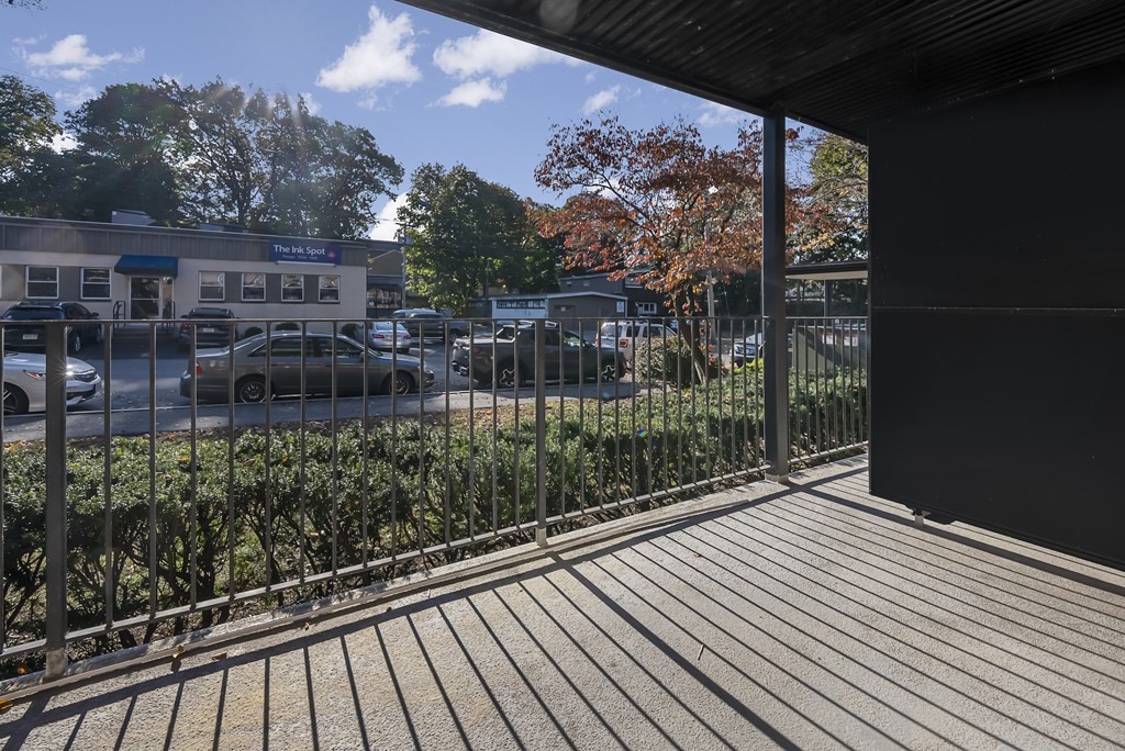 45 Oval Road, Unit 12 Quincy, MA 02170 - Photo 7 of 12 a view of a building from a balcony