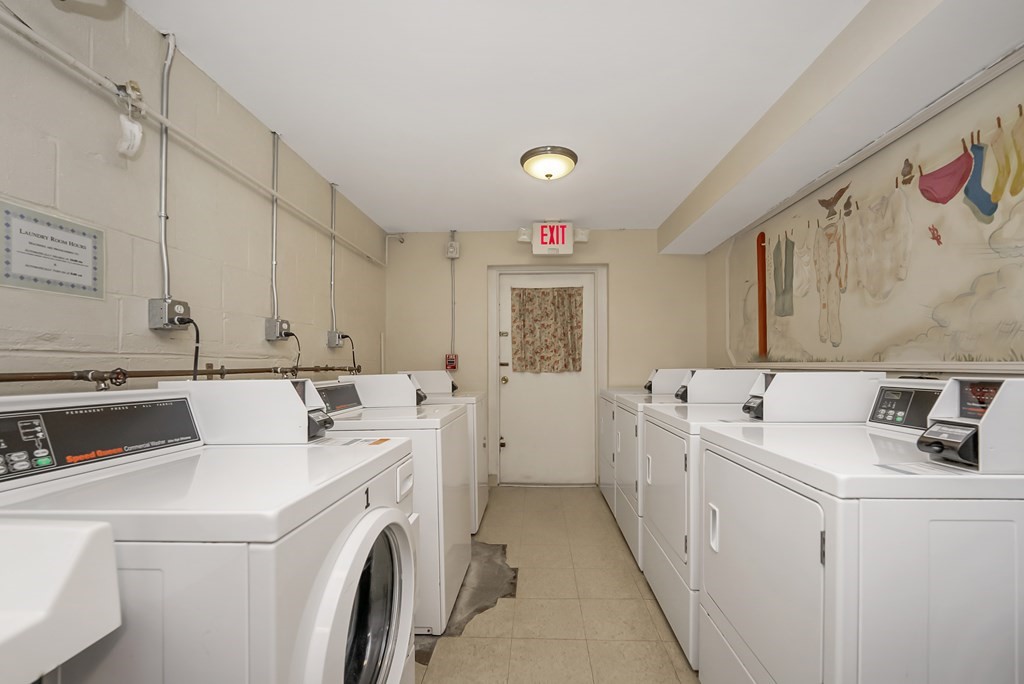 45 Oval Road, Unit 12 Quincy, MA 02170 - Photo 9 of 12 a utility room with dryer and washer