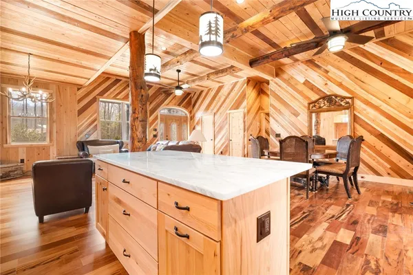 a kitchen that has a cabinets and a wooden floors