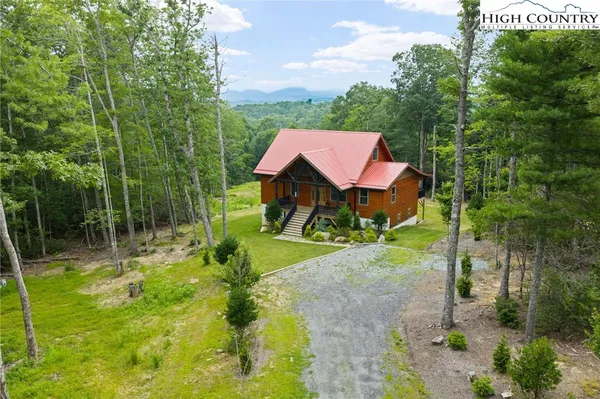 a view of a and trees in a field