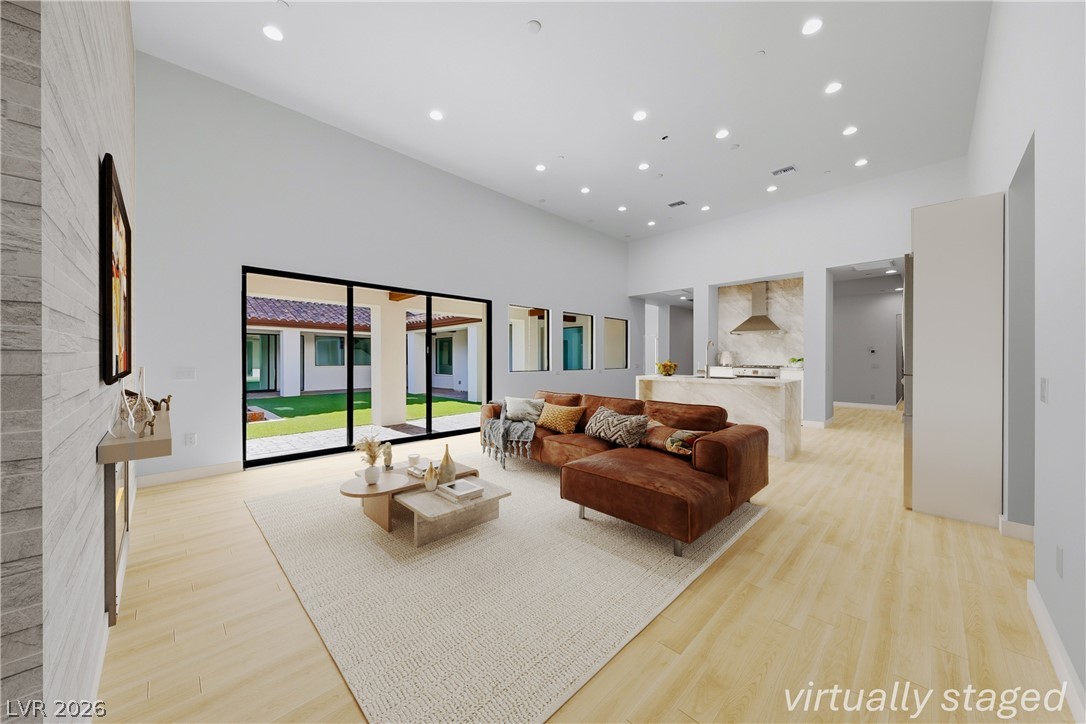 1140 Julie Road Henderson, NV 89002 - Photo 18 of 85 An airy living space with soaring ceilings and luminous recessed lighting.1140 JULIE Rd Henderson NV 89002 Virtually staged
