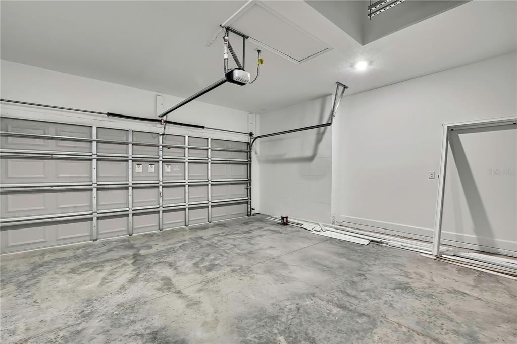 6589 Freeport Drive Spring Hill, FL 34608 - Photo 47 of 63 a view of an empty garage
