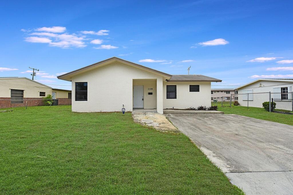 1109 West 23rd Street Riviera Beach, FL 33404 - Photo 13 of 15 Front