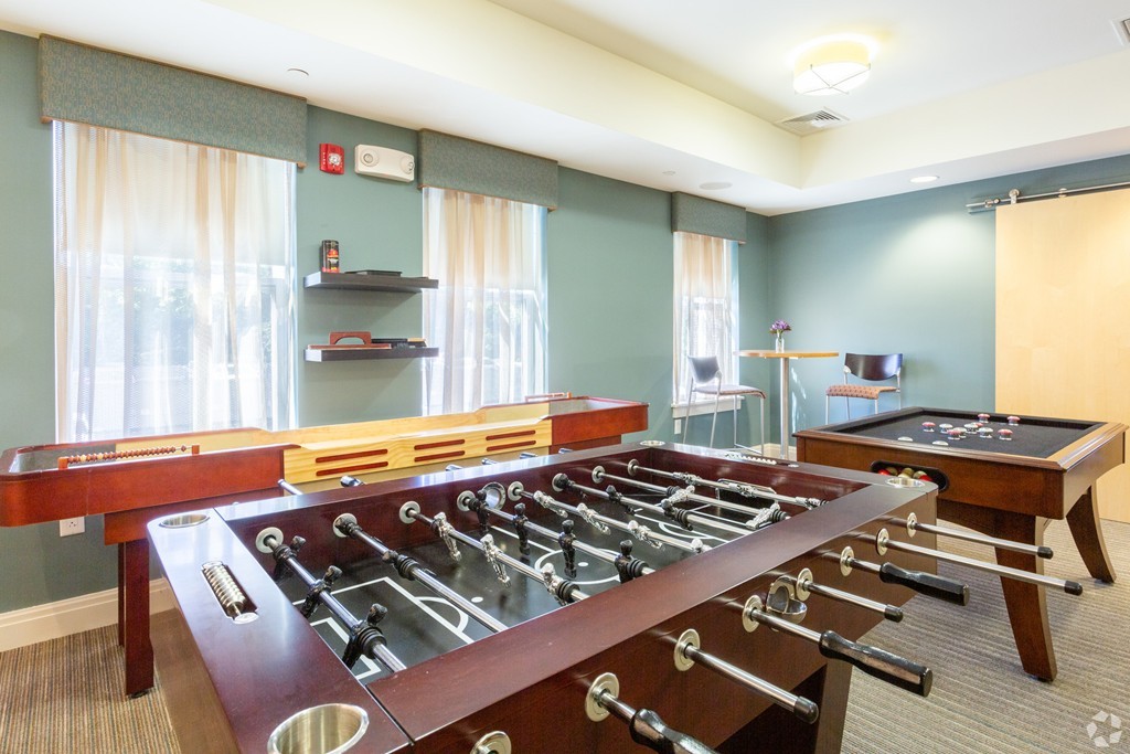 30 Mill Street, Unit 206 Arlington, MA 02476 - Photo 12 of 23 a bedroom with furniture and a window