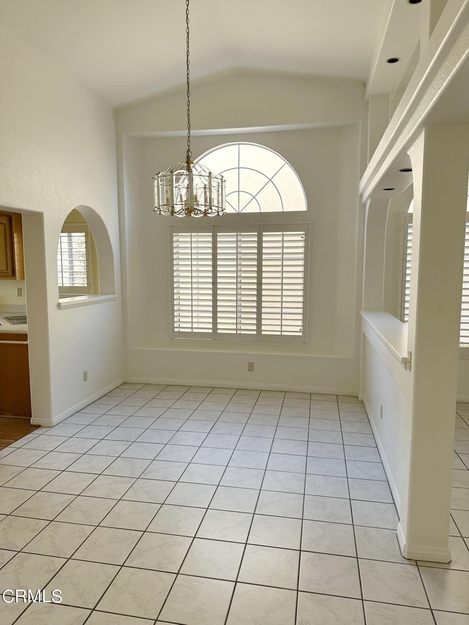 2190 Eastridge Loop Oxnard, CA 93036 - Photo 6 of 21 a view of an empty room with a window